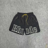 GO-STONE High street fashion RHUDE letter printed hip-hop casual pants beach pants men's five quarter shorts
